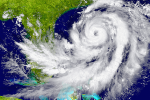 Hurricane Season Preparation: Tips From A Professional Roofer, Pride Roofing LLC. in Albany La. image of satellite view of hurricane coming towards the gulf coast of the United States of America