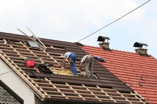 How Long Does It Take to Install New Roofs? | Pride Roofing LLC in Louisiana. Image of two men doing new roof installation.