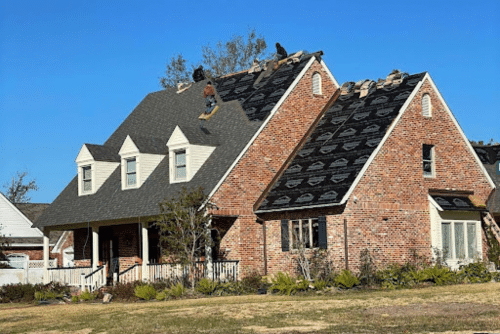 signs your roof needs repairs in Hammond, LA with Pride Roofing LLC. Image of brick home getting new roof and shingles put on after repairs were necessary in southeast Louisiana.